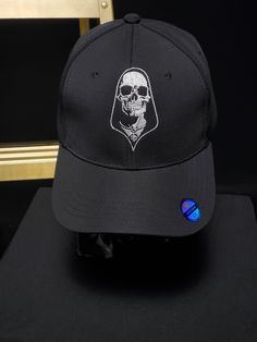 Skeleton fitted hat with glow in the dark embroidered design, as well as black/blue light effects Hooded Skeleton, Michelle Carter, Men Fits, Fitted Hat, Embroidered Design, Fitted Hats, Trucker Cap, In The Dark, Blue Light