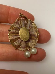 Vintage 14k yellow gold sun hat charm. The charm has two pearls. The charm weighs 2.59 grams of gold. Heirloom Style Yellow Gold Pearl Jewelry, Heirloom Yellow Gold Pearl Jewelry, 14k Yellow Gold Jewelry With Pearl Charm, Yellow Gold Brass Jewelry With Pearl Charm, Oval Pearl Pendant In Yellow Gold, Elegant Yellow Gold Jewelry With Vintage Charm, Elegant 14k Gold Vintage Charm Jewelry, Elegant 14k Gold Jewelry With Vintage Charm, Vintage Gold Jewelry With Akoya Pearl