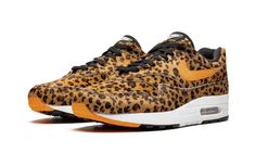 The atmos x Nike Air Max 1 “Leopard” is one of three colorways from the “Animal Pack 3. 0” collection released in 2019.  Japanese sneaker retailer atmos separated the animal prints from their famous “Animal” colorway of the Air Max 1 into three new versions of the silhouette, each featuring only one of the leopard, giraffe, and tiger prints across the entire upper.  This “Leopard” colorway is constructed in the faux fur leopard print with bright orange accents for the Swooshes, heel Nike logos, Nike Logos, Leopard Nikes, Leopard Shoes, Nike Air Max 1, The Leopard, Orange Accents, Air Max 1, Tiger Print, Animal Prints