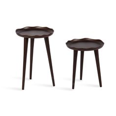 two small wooden tables sitting next to each other