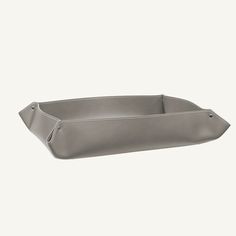 a gray rectangular shaped tray with handles