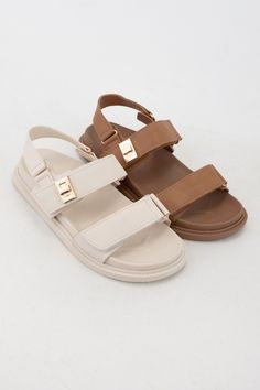 Embrace the warmth of the sun in our Double Strap Open Toe Sandals, designed for the ultimate spring and summer style statement. These sandals boast a timeless design with two straps delicately hugging the foot and an open-toe silhouette for a breezy feel. Whether you're strolling through the park or enjoying brunch with friends, these sandals offer the perfect blend of comfort and sophistication. Pair them with your favorite sundress or cropped jeans for an effortlessly chic look that embodies the essence of the season. Open Toe Sandals, Toe Sandals, Style Statement, Boot Shoes Women, Cropped Jeans, The Park, Summer Style, Sundress, Labour Day