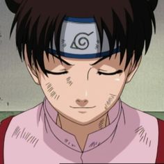 an anime character with black hair wearing a pink shirt and cat ears on his head