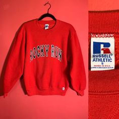 "VTG Russell Athletic Made In USA \"Rocky Run\" Red Thick Pullover Mens Small" Red Letter Print Casual Sweater, Red College Sweater With Ribbed Cuffs, Red Varsity Sweatshirt With Graphic Print, Collegiate Red Sweater For Fall, Red Varsity Winter Top, Red Varsity Top For Winter, Red Relaxed Fit Sweater With Letter Print, Sporty University Red Crew Neck Sweatshirt, Collegiate Red Sweatshirt For Sports Season