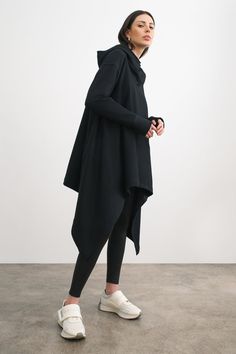 Long and flowing, our Rivington Sweatshirt Tunic is pure athleisure luxury. In our breathable midweight French Terry, she features an asymmetric silhouette and a gloriously oversized fit, with her sides cascading down to create a stunning, angular hemline. Her extra-long sleeves are finished with thumbholes, and her co Athleisure Luxury, Wardrobe Wishlist, Designer Sweatshirts, Minimalist Women, Tunic Sweatshirt, Extra Long Sleeves, Hoodie Pullover, Sweatshirt Dress, Long Hoodie