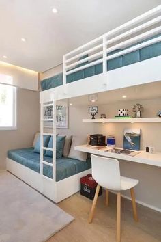 there is a bunk bed and desk in this room with white walls, carpeted flooring and wooden floors