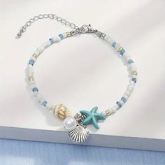 This charming bracelet features a beautiful starfish design, adding a touch of beachy elegance to any outfit. The braided chain is strong and durable, ensuring it will last for years to come. The wrap style is perfect for layering with other bracelets, creating a unique and personalized look. Crafted with high-quality materials, this bracelet is a must-have for any fashion-forward individual. Its versatile style makes it an ideal accessory for both casual and formal occasions, making it a great addition to any jewelry collection. With its unique design and durable construction, this starfish braided bracelet is sure to become a staple in your wardrobe. Starfish Bracelet, Beach Bracelets, Friendship Jewelry, Necklace For Girlfriend, Summer Bracelets, Shell Bracelet, Summer Necklace, Birthday Jewelry Gift, Girls Jewelry