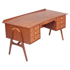 a wooden desk with three drawers on one side and two small legs on the other