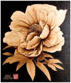 a painting of a flower on a black background