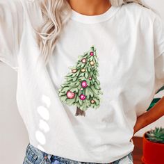 Whimsical Christmas Tree Shirt, Holiday Sweatshirt, Christmas Tree shirt, Whimsical Tree, Trendy Christmas Sweatshirt, Christmas Lights Tree Comfort Colors 1717 is the perfect choice for an oversized trendy look! So comfy!  These are garment-dyed t-shirts made 100% with ring-spun cotton. The soft-washed fabric brings extra coziness to your wardrobe while the relaxed fit makes it an excellent daily choice. The double-needle stitching throughout the tee makes it highly durable while the lack of si Christmas Cotton T-shirt, Christmas Holiday Cotton T-shirt, Christmas Cotton T-shirt For Holiday, Christmas Cotton T-shirt For The Holidays, Festive Christmas Cotton Shirt, Festive Christmas Cotton Tops, White Christmas Festive T-shirt, Festive Cotton T-shirt For New Year, Christmas Lights Tree