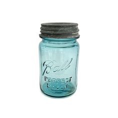 a blue mason jar with a metal lid