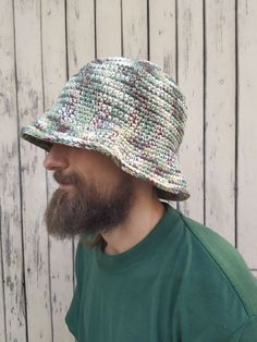 "Crochet Bucket Hat Man / Women. Unisex bucket hat made of cotton mix. These hats are so colorful that they can never be done the same 🤗 So... you will have a unique piece! They are suitable for spring and autumn weather. The yarn is soft. You can wash it in the washing machine with cold water. Size S/M fits well small heads (54-56cm / 21\"-22\") Size M/L fits well standard heads (57-59cm / 23\") Size XL fits well with a larger noggin (60-62cm / 24\") Yarn: Mix of cotton and acrylic Don't hesitate to get in touch with me for a custom order or if you need any further information. If you want a hat in a custom color, you should write the color you want in the order note or just contact me. I will send you all available variants for your choice. Thank you for visiting my shop ❤️ Polina ❤️" Crochet Bucket Hat For Men, Crochet Hat Men, Diy Baby Bows Headbands, Diy Baby Bows, Rave Hats, Women Bucket Hat, Crochet Mens Hat, Handmade Bikinis, Crochet Sun Hat