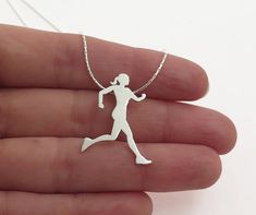 Running women pendant necklace, handmade of sterling silver.A Running men necklace is also available in a link below.This beautiful runner pendant necklace is a part of my sports lovers jewelry collection.The pendant is 100% handmade by me. I saw each pendant by hand from a durable, solid sterling silver sheet, file it, solder the ring on the back, and give it a shiny finish.This necklace is a great gift idea for a runner or a coach.✦ ITEM DETAILS ✦Sterling silver pendant necklace.✦ Measurements Running Necklace, Running Woman, Man Necklace, Lovers Jewelry, Necklace Measurements, Silhouette Necklace, Silver Necklace For Women, Gold Necklace Simple, Sports Jewelry