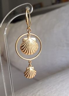 "SALE 40% - Original price was 84$ Now is 53$ for option #1. For option #2 original price was 51$ Now is 31$ These beautiful cool Gold filled Shell and circle earrings are made from Gold filled and Shells are 2018 most Trendy items. They make a thoughtful sister gift or friendship gift for a special person, just to remind them that you are thinking of them each time they look in the mirror or in their jewelry box ❤️ Or just buy them as a gift for yourself. For every day use, great for vacation s Shell Hoop Earrings, Gold Feather Earrings, Long Gold Earrings, Gold Coin Necklace, Seashell Jewelry, Gold Medallion, Gold Feathers, Coin Earrings, Hoop Earrings Gold