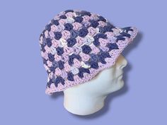 These handmade crochet bucket hats are 70s inspired and made with 100% cotton yarn. Cotton is machine washable, however with any cotton some shrinkage may occur in hot water or dryer. To prevent this either handwash/machine wash in cold water and lay flat to dry. The cotton blend is light and breathable so these hats are wonderful in the spring and summer! Purple Crochet Hat For Spring, Handmade Purple Crochet Hat For Spring, Purple Brimmed Crochet Hat For Spring, Handmade Casual Purple Crochet Hat, Handmade Purple Crochet Hat With Curved Brim, Purple Crochet Hat For Beach Spring Season, Purple Yarn Crochet Bucket Hat, Pink Cotton Crochet Bucket Hat, Purple Crochet Yarn Bucket Hat