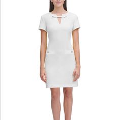 Wear To Work Tommy Hilfiger Dress With A Grommet Neckline Adding An Edgy Yet Sophisticated Look. Approx. Model Height Is 5'10" And Model Is Wearing A Size 4. Approx. 33 3/4" Long From Center Back To Hem. Length Is Based On Size And Varies 1/4" Between Sizes. V-Neck Structured Knee-length Mini Dress For Spring, Chic A-line Tommy Hilfiger Dress, Chic Tommy Hilfiger Dresses For Work, Chic Tommy Hilfiger Dress, Elegant Tommy Hilfiger Dresses For Workwear, Fitted Tommy Hilfiger Sheath Dress, Tommy Hilfiger Fitted Sheath Dress, White Tommy Hilfiger Dress For Work, Chic Tommy Hilfiger Mini Dress For Work