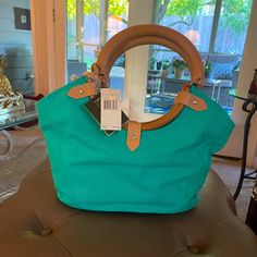 Beautiful Teal/Light Green Ralph Lauren Purse. Handles Are A Thick Leather Like Material & The Bottom Near Bottom- Wooden. Pictures Show How The Purse Is. New With Tags. Only Stored In Closet! Smoke Free Home Comes With The Little Change Purse! Ralph Lauren Purse, Ralph Lauren Wallet, Teal Light, Ralph Lauren Bags, Ralph Lauren Leather, Denim Purse, Straw Tote Bag, Black Leather Tote Bag, Black Leather Wallet