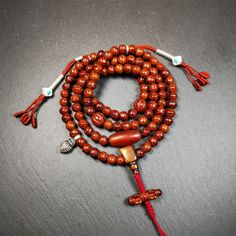 ❤This bodhi beads mala is made by Tibetan craftsmen and come from Hepo Town, Baiyu County, the birthplace of the famous Tibetan handicrafts,about 30 years old, hold and blessed by a lama in Baiyu Monastery.It is composed of 108 bodhi seed beads, and is equipped with 3 agate beads, silver bead counters are installed on both sides, 1 mani jewel bead clip,and finally consists a bone guru bead and vajra on the end, very elegant.❤Details1. Handmade 108 bodhi beads approximately 8mm,mala's perimeter i Spiritual Brown Mala For Meditation, Brown Spiritual Mala For Meditation, Spiritual Brown Beaded Bracelets, Brown Spiritual Beads For Meditation, Brown Wooden Beads Spiritual Mala, Spiritual Brown Wooden Beads Mala, Bohemian Brown Mala For Rituals, Spiritual Healing Brown Beads, Handmade Brown Beads For Puja