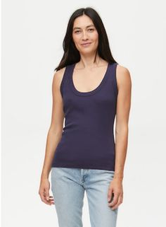 Layered or alone, this Michael Stars tank will be your closet MVP. The Nelly tank is crafted in soft ribbed fabric and features a slightly fitted silhouette with a flattering scoop neckline and wide trim. Tuck into trousers or layer with your favorite jacket. Made in the USA 100% Cotton Jersey Machine Washable & Dryable One Size Fits Most Summer Ribbed Tank Top With Scoop Back, Fitted Ribbed Tank Top With Scoop Back, Everyday Ribbed Scoop Neck Camisole, Everyday Ribbed Camisole With Scoop Neck, Fitted Scoop Neck Tank Top For Layering, Ribbed Fitted Scoop Neck Tank Top, Ribbed Fitted Tank Top With Scoop Neck, Ribbed Stretch Tank Top With Scoop Back, Stretch Ribbed Tank Top With Scoop Back