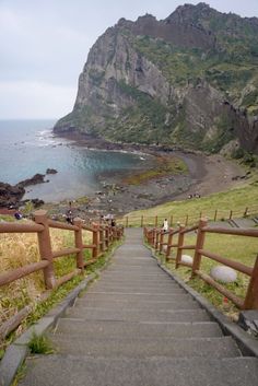 stairs lead down to the beach and ocean