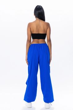 Royal blue cargo pants with an elastic waistband and adjustable ankles. Return Policy WE ONLY OFFER STORE CREDIT FOR RETURNS! Feel free to email us at info@shopluxxeapparel.com or DM us with any questions regarding fit, styling, or our return policy in general. To read more into our return policy please click here. Blue Straight Leg Parachute Pants In Cargo Style, Blue Cargo Pocket Pants For Summer, Blue Cargo Pants With Pockets For Summer, Blue Cargo Style Parachute Pants With Straight Leg, Blue Stretch Bottoms With Side Pockets, Blue Wide Leg Bottoms With Cargo Pockets, Blue Parachute Pants With Side Pockets For Spring, Blue Cargo Style Straight Leg Parachute Pants, Blue Cargo Pants For Spring