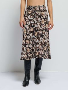 It's true, you need a statement skirt. This one features a structured waistband, front placket with corozo buttons, and back princess seams. Add a tall boot or a strappy sandal to mix up the vibe. (This one comes in Night Floral). | Women's Belinda Skirt in Night Floral | Ethical Essentials Statement Skirt, Button Skirt, Tall Boot, Belted Jacket, Princess Seams, Solid & Striped, The Vibe, Paige Denim, Knit Pants