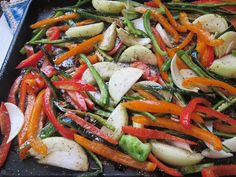 vegetables are being cooked in a pan on the stove