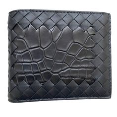 The Bottega Veneta Intrecciato Nappa/Croc Leather Bifold Wallet Features 8 Interior Card Slots, Two Bill Compartments, And Two Additional Pockets. Crafted With Nappa Leather And Croc Leather With Calfskin Lining, This Italian-Made Accessory Is A Wonderful Addition To Your Luxury Small Leather Items Collection. Intrecciato Leather Wallet With Croc Leather Section On The Front Color: Black Eight Interior Card Slots, Two Bill Compartments, Two Additional Pockets Material:100% Calfskin With A Fronta Designer Black Wallets With Leather Lining, Luxury Evening Wallet With Leather Lining, Designer Black Leather Wallet, Luxury Black Wallets With Coin Pocket, Luxury Black Wallet With Coin Pocket, Designer Black Bifold Wallet, Designer Leather Wallet With Rfid Blocking, Designer Leather Bifold Wallet, Designer Bifold Leather Wallet