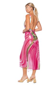 This pareo cover up is made of sheer fabric with a printed design and tassel details. Can be tied a multitude of ways. 100% polyester One size fits most Spring Beach Party Cover-up With Tie Waist, Chic Printed Beach Dress Cover-up, Chic Printed Beach Dress For Cover-up, Multicolor Printed Wrap Cover-up, Chic Printed Beach Dress For Beach Party, Multicolor Swimwear With Side Ties For Vacation, Floral Print Wrap Beachwear Cover-up, Spring Vacation Tie-side Sarong, Spring Vacation Swimwear With Side Ties