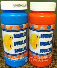 two bottles of bubbles on a counter with the label bubbleers are blue and orange