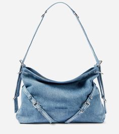 Givenchy Voyou medium denim shoulder bag (Mytheresa). Material: fabric. Colour: Medium Blue. Step out in style with this #chic denim shoulder bag. #fashion #bag #purse #bagsandpurses #outfits #luxury #givenchy Balenciaga Hourglass Bag, Denim Shoulder Bag, Gucci Crossbody Bag, Givenchy Bag, Denim Shoulder Bags, Gucci Crossbody, 2025 Vision, Crossbody Bags For Women, Luxury Purses