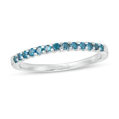 Celebrate your years together with this tailored diamond anniversary band. Created in 14K white gold, this sophisticated style features a row of 13 alluring enhanced blue diamonds. Captivating with 1/4 ct. t.w. of diamonds and a brilliant buffed luster, this ring complements any look with ease. Diamond Anniversary Bands, Blue Diamonds, Diamond Anniversary, Anniversary Bands, Blue Diamond, Diamond Clarity, Diamond Stone, White Metal, Sophisticated Style