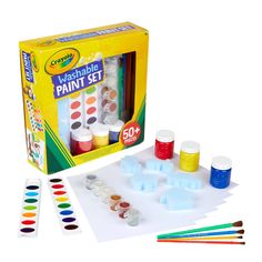 an assortment of paint and watercolors in a box