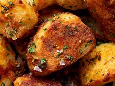 cooked potatoes with herbs and seasoning on top