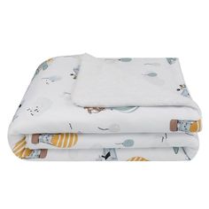 two sheets with animals on them, one is white and the other is yellow