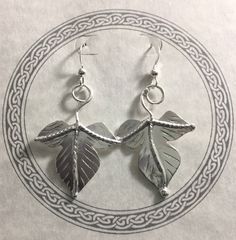 I've fabricated these woodland inspired leaf earrings to be reminiscent of Autumnl, creating two detailed autumn leaves which dangle from ear wire hook style earring components. The leaves are approximately one inch in size and the dangle earrings add another inch for a total length of two inches when worn. I've made these from 22 gauge thick sheet so it's plenty strong and durable with a nice weight when worn, but not too overwhelming to pull or tug the ear lobes. **The last image I've shown th Handmade Leaf-shaped Earrings, Handmade Leaf-shaped Nature-inspired Earrings, Nickel-free Leaf-shaped Nature-inspired Earrings, Woodland Autumn, Woodland Earrings, Leaf Bracelet, Autumn Leaf, Earrings Simple, Simple Earrings