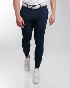 Sporty 4-way Stretch Pants For Golf, Stretch Moisture-wicking Golf Bottoms, Moisture-wicking Stretch Golf Bottoms, Casual Stretch Golf Pants, Casual Stretch Pants For Golf, Athleisure Activewear For Golf, Moisture-wicking Athleisure Bottoms For Golf, Stretch Athleisure Activewear For Golf, Fitted Tapered Leg Golf Pants