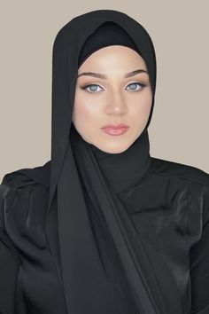 Our Luxury Chiffon Hijab-Black is perfect for every occasion. With the softest chiffon fabric we could find, our Luxury Chiffon will become your go to hijab whether you're going out to a fancy party or keeping it casual, looking beautiful is effortless! Fabric: Polyester Chiffon Dimension: 70" x 27" Contour: Long Rectangle Thickness: Light Texture: Smooth Care: Machine or hand wash in warm water, tumble dry or air dry, iron if needed. Hijab Fabric, Hijab Black, Black Hijab, Chiffon Hijab, Beautiful Muslim Women, Fancy Party, Light Texture, Formal Looks, Fine Fabric