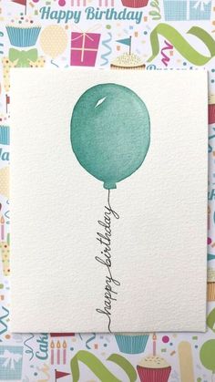 a birthday card with a green balloon on it