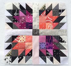 a patchwork quilt is shown with different colors