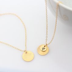 Monogram Initial gold Personalized Necklace, Three in one Necklace, Reese Witherspoon's circle Necklace. You can flip the disc to wear the necklace in three different looks depending on the occasion!! This brushed circle Necklace is worn by so many celebrities like Kelly Ripa, Jennifer Lopez, Miley Cyrus and Taylor Jacobson. You will fell in love with it I promise. Don't want to miss this item? you can Pin it, tweet it or share with your Facebook account, there is a button to Save It and revisit Gold Adjustable Round Disc Charm Necklaces, Nickel Free Round Disc Yellow Gold Necklace, Nickel Free Yellow Gold Round Disc Necklace, Nickel-free Yellow Gold Round Disc Necklace, Personalized Gold Coin Necklace With Round Pendant, Personalized Gold Coin Necklace, Om Jewelry, Disk Necklace, Personalized Gold Necklace