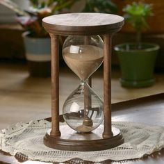 an hourglass sitting on top of a table