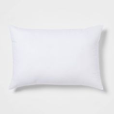 a white pillow on a white background