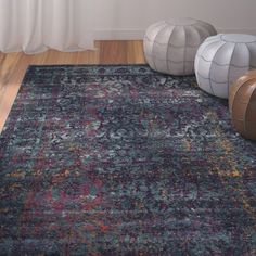 an area rug with various colors and shapes