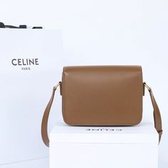 Size: 18.5cm*14cm*6cm It comes with Dust box, Care manual, Tag, and Paper bag. Luxury Rectangular Saddle Bag For Daily Use, Luxury Saddle Bag For Daily Use, Designer Brown Box Bag For Mobile Phone, Luxury Rectangular Saddle Bag For Shopping, Classic Rectangular Satchel For Shopping, Modern Brown Flap Bag For Shopping, Brown Rectangular Shoulder Bag For Shopping, Classic Flap Bag With Rectangular Case For Shopping, Designer Brown Rectangular Flap Bag