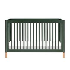 a green crib with white sheets on the bottom and side rails, against a white background