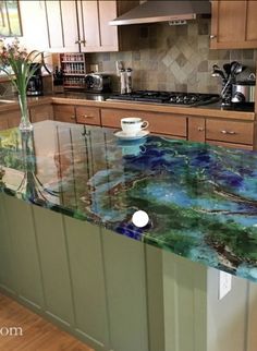 a kitchen counter top with blue and green marble