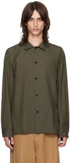 Polyester- and wool-blend twill shirt. · Spread collar · Button closure · Welt pocket at chest · Droptail hem · Vented side seams · Pleats at adjustable single-button barrel cuffs · Knife pleats at back · Logo-engraved black hardware Supplier color: Khaki Wool Tops With Button Closure For Work, Collared Wool Top With Buttons, Wool Workwear Top With Buttons, Wool Tops With Welt Pockets For Workwear, Wool Shirt With Pockets For Work, Wool Top With Lapel Collar For Work, Wool Button-up Shirt With Pockets, Knife Pleats, Pleated Shirt