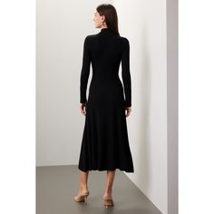 Black knit (45% Recycled polyester, 30% Merino wool, 20% Acrylic, 5% Polyamide). Sweater sheath. Long sleeves. Mock neck. Front zipper closure. 49" from shoulder to hemline. Imported. Turtleneck Stretch Midi Dress For Work, Stretch Turtleneck Midi Dress For Work, Fitted Wool Sweater Dress, Fall Office Midi Dress With Stretch, Stretch Midi Dress For Office In Fall, Fall Stretch Midi Dress For Office, Fitted Chic Wool Sweater Dress, Chic Fitted Wool Sweater Dress, Fitted Knee-length Sweater Dress For Work