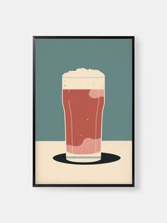 a glass of beer sitting on top of a table next to a wall mounted poster